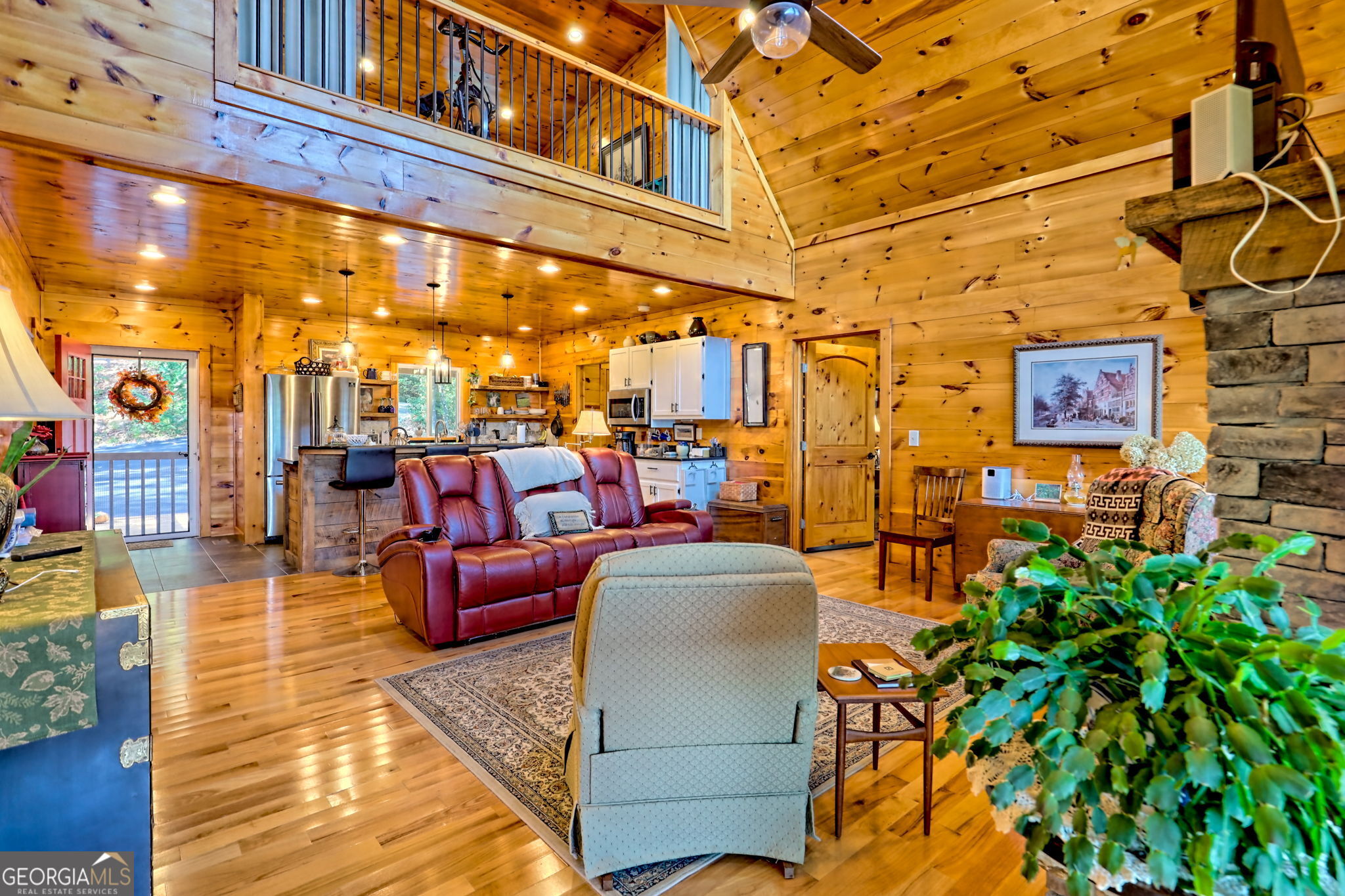 557 Walnut Grove Lane Tiger, GA 30576 - Photo 7 of 75 a view of a patio with couches and potted plants