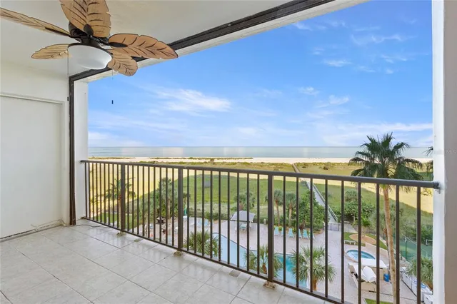 a view of a hallway with a chandelier
