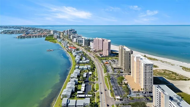 a view of a city and ocean
