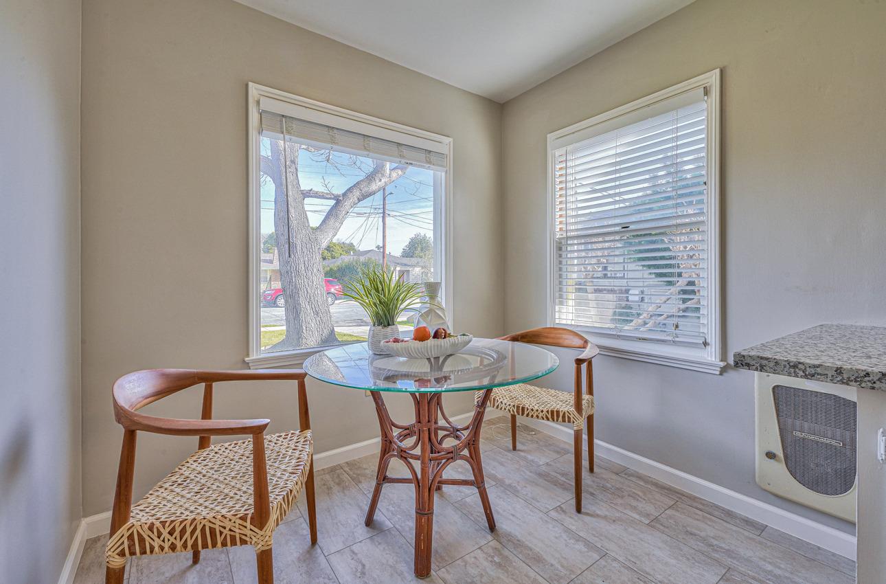 402 Lorimer Street Salinas, CA 93901 - Photo 15 of 36 a view of a dining room with furniture and wooden floor