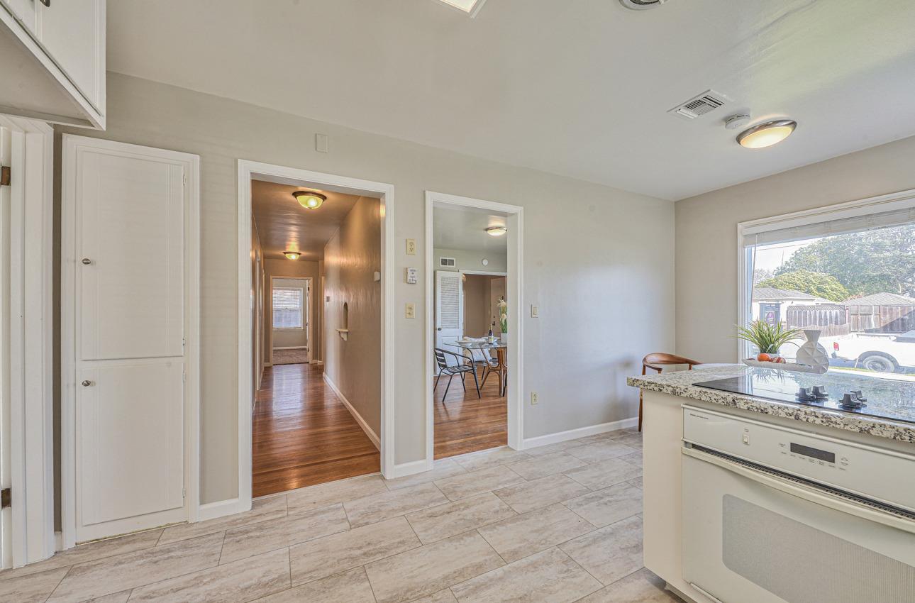 402 Lorimer Street Salinas, CA 93901 - Photo 16 of 36 a kitchen with a sink cabinets and wooden floor