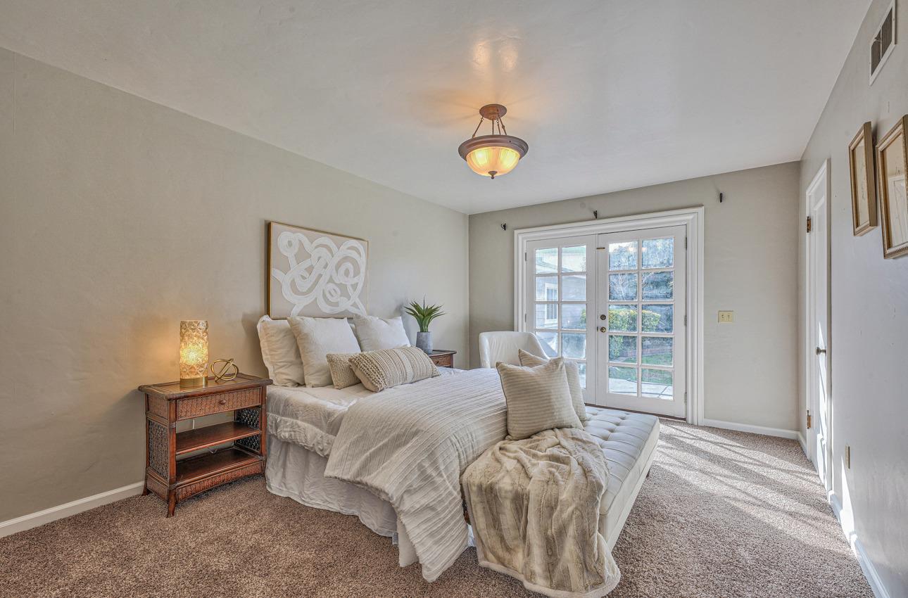 402 Lorimer Street Salinas, CA 93901 - Photo 17 of 36 a bedroom with a bed and a window