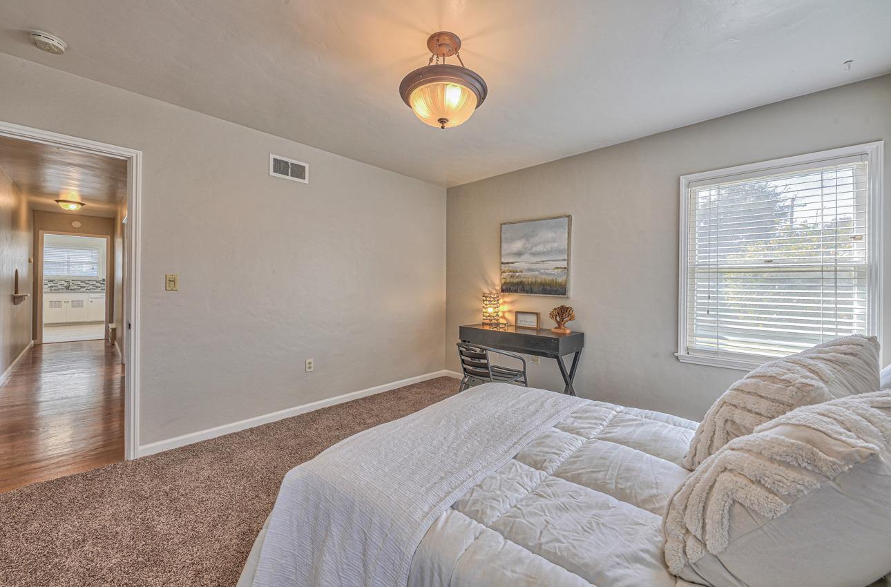 402 Lorimer Street Salinas, CA 93901 - Photo 23 of 36 a bedroom with a bed and a window