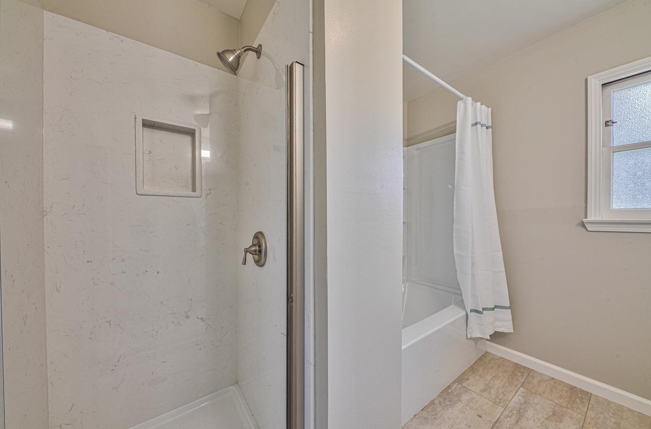 402 Lorimer Street Salinas, CA 93901 - Photo 27 of 36 a bathroom with a bathtub