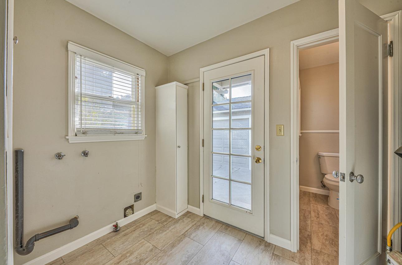 402 Lorimer Street Salinas, CA 93901 - Photo 28 of 36 a view of an empty room with wooden floor and a window