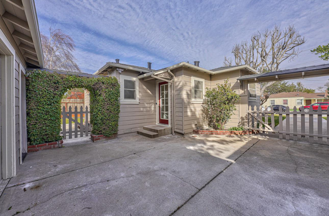 402 Lorimer Street Salinas, CA 93901 - Photo 31 of 36 a view of a house with a yard and potted plants