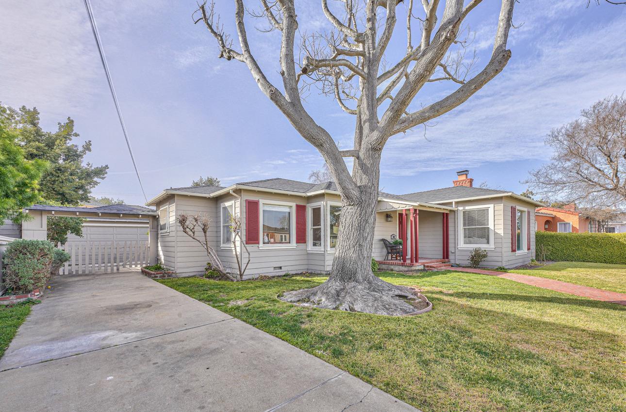 402 Lorimer Street Salinas, CA 93901 - Photo 36 of 36 a front view of a house with a yard and trees