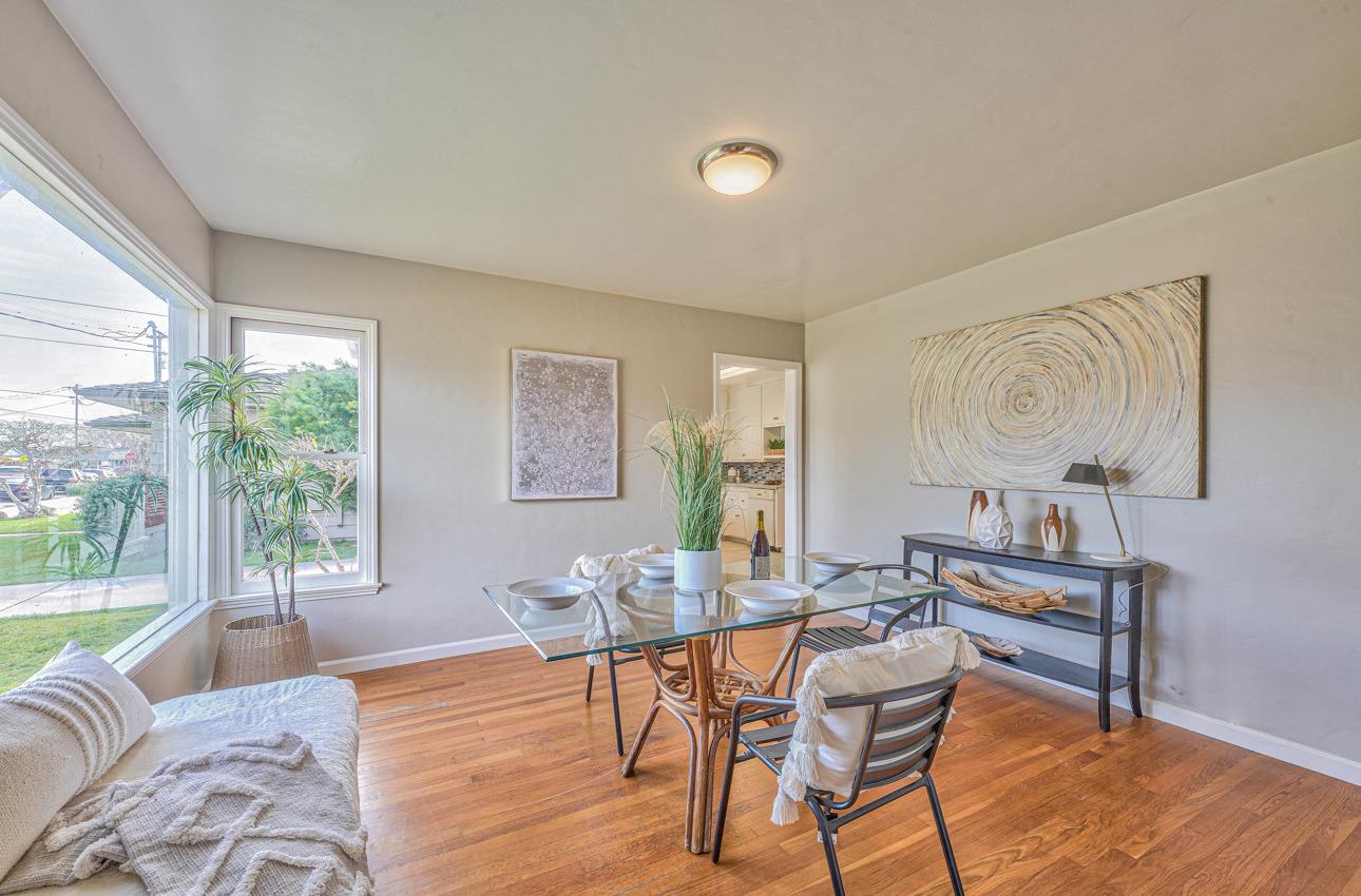 402 Lorimer Street Salinas, CA 93901 - Photo 9 of 36 a living room with furniture and a large window