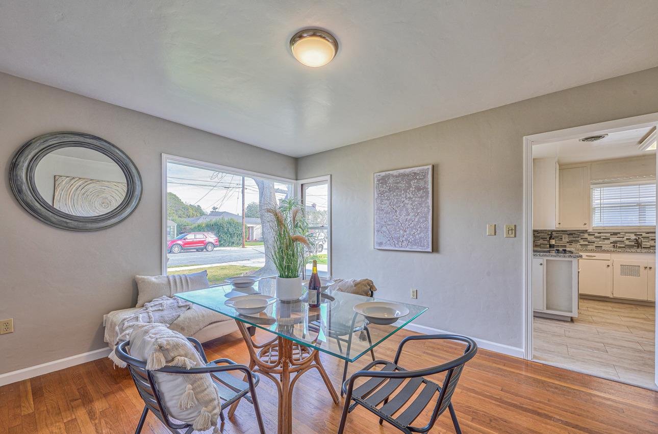402 Lorimer Street Salinas, CA 93901 - Photo 10 of 36 a dining room with furniture and a floor to ceiling window