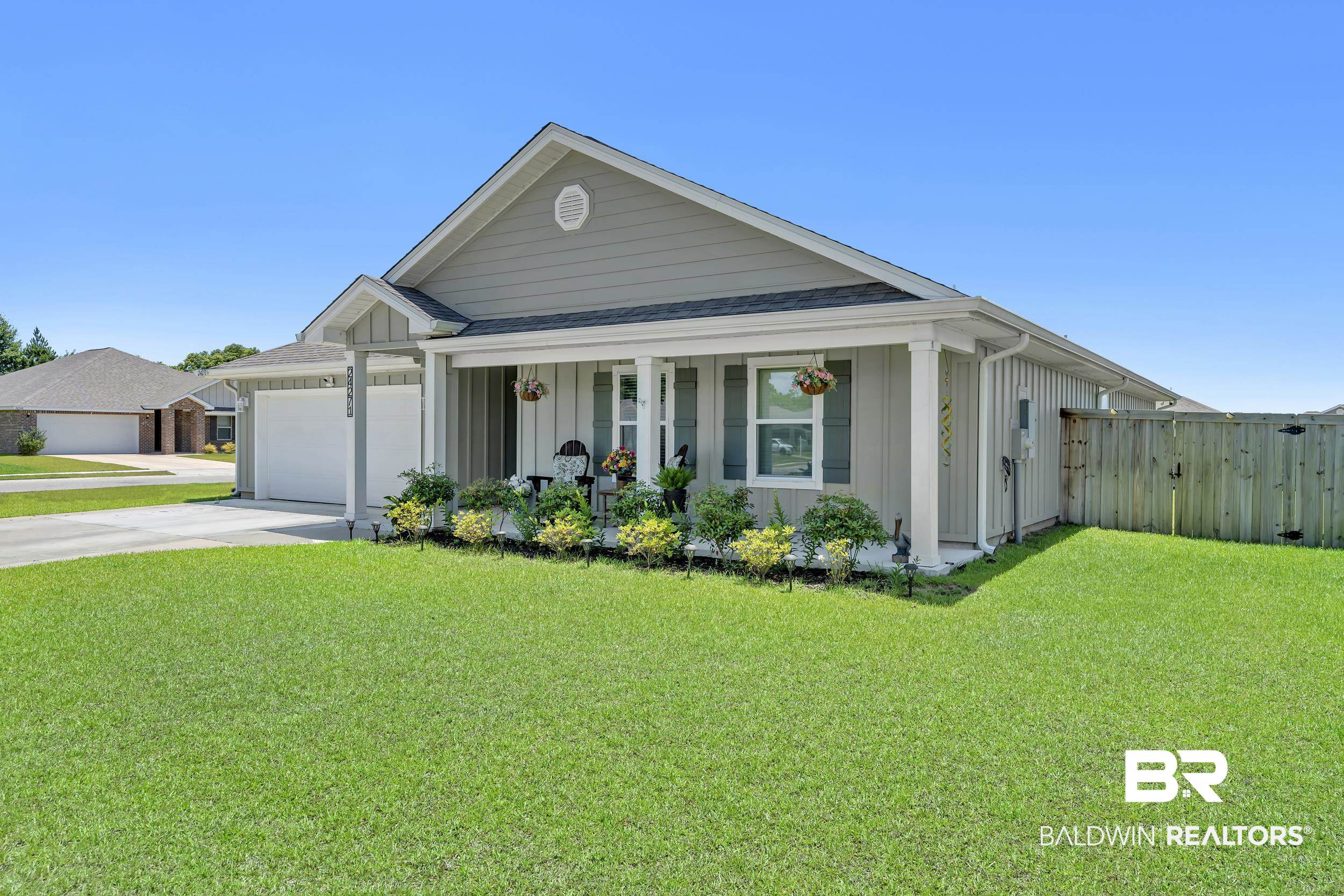 24271 Ringneck Loop Elberta, AL 36530 - Photo 35 of 44 Ranch-style exterior featuring light gray siding and a covered front porch
