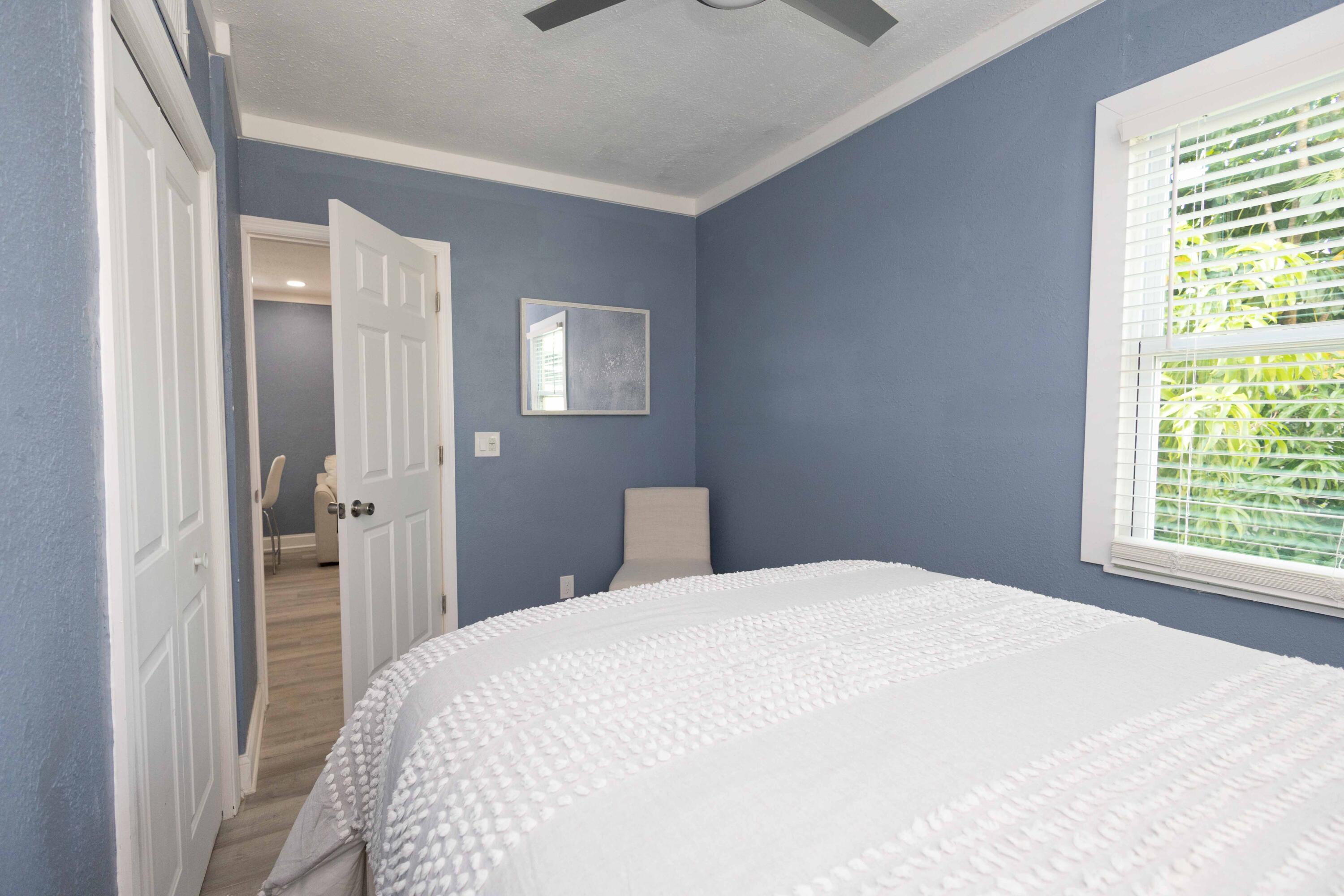 420 Avenida Alegre, Unit 4 West Palm Beach, FL 33405 - Photo 14 of 33 a bedroom with a bed and a window