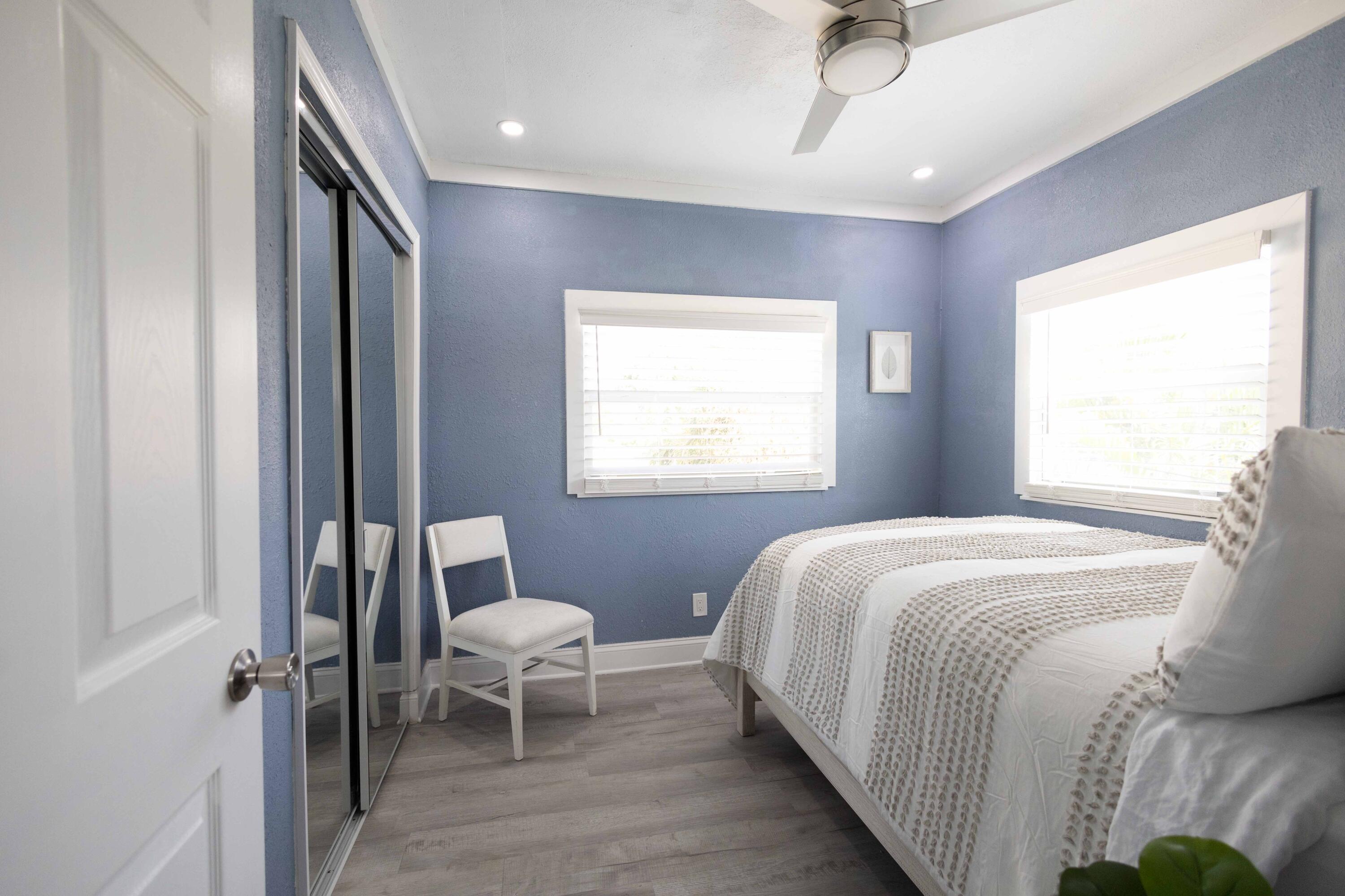 420 Avenida Alegre, Unit 4 West Palm Beach, FL 33405 - Photo 17 of 33 a bedroom with a bed and a window