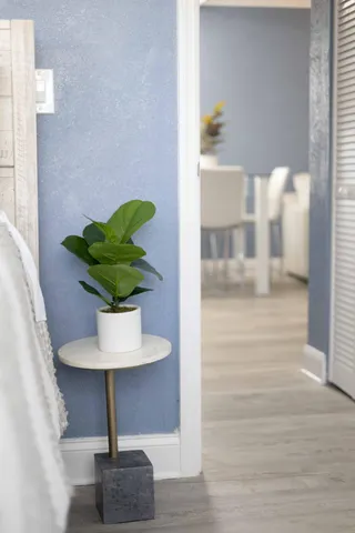 a vase of flowers sitting on a table