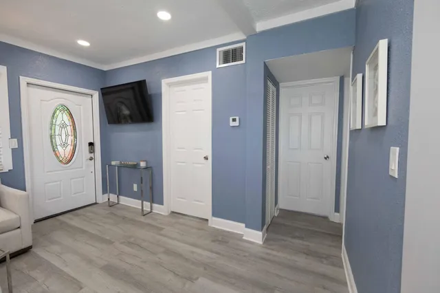 a view of hallway with washer and dryer