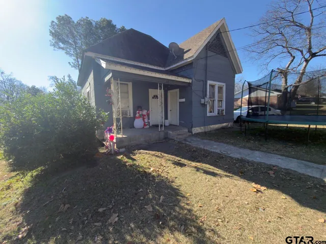 a view of a house with a patio