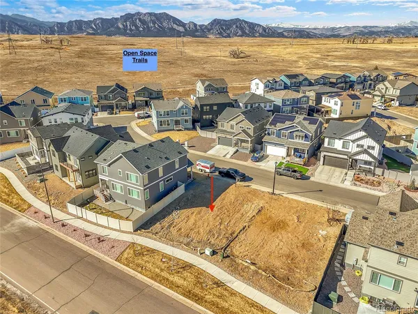 swimming pool with outdoor seating and lake view