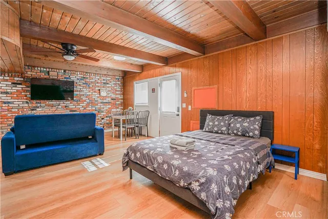 a kitchen with stainless steel appliances a refrigerator and a stove