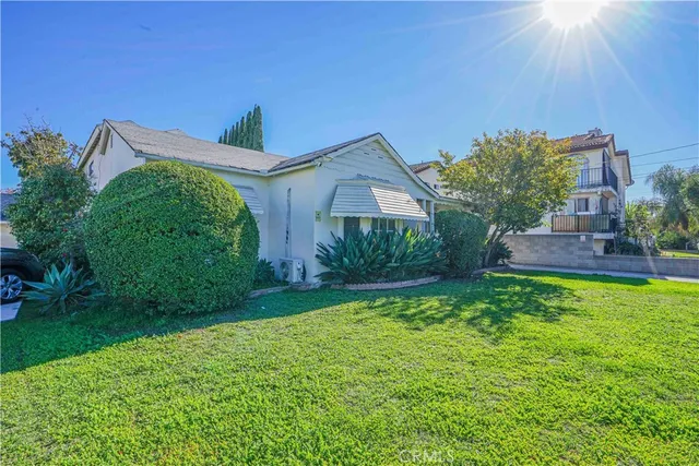 a house view with garden space