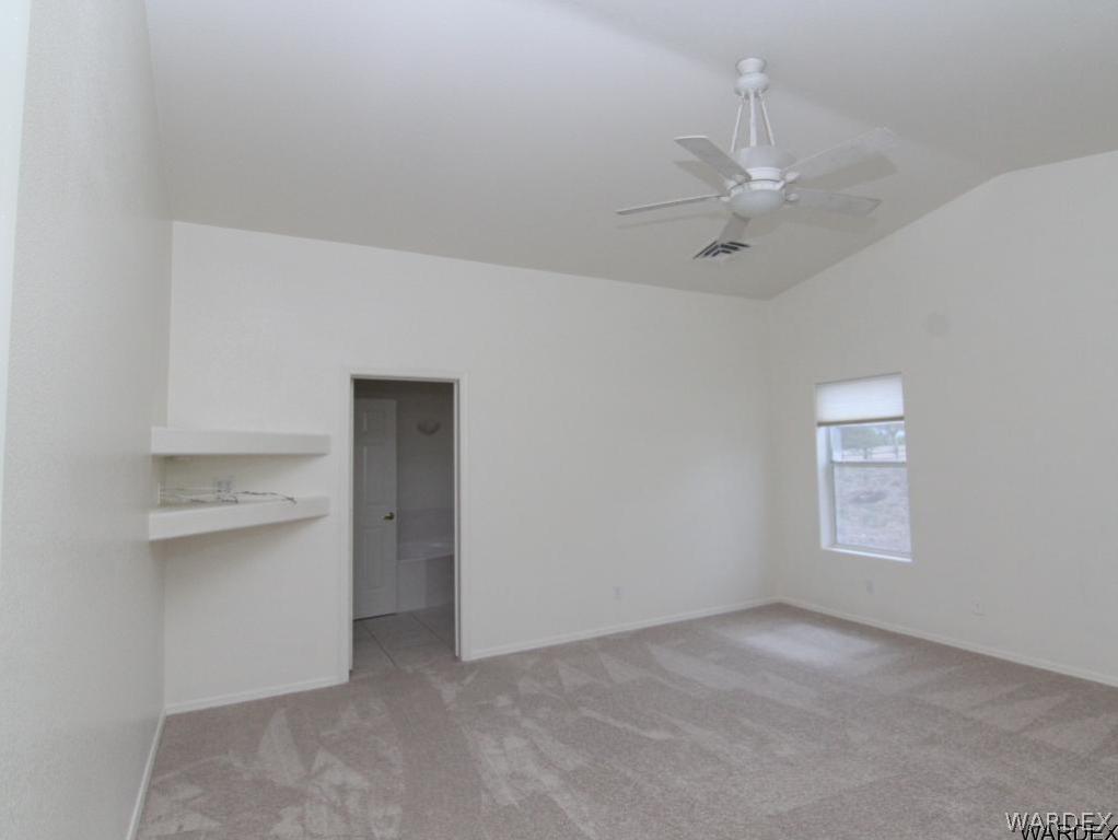 2010 East Cactus Wren Road Kingman, AZ 86409 - Photo 17 of 34 Master Bedroom