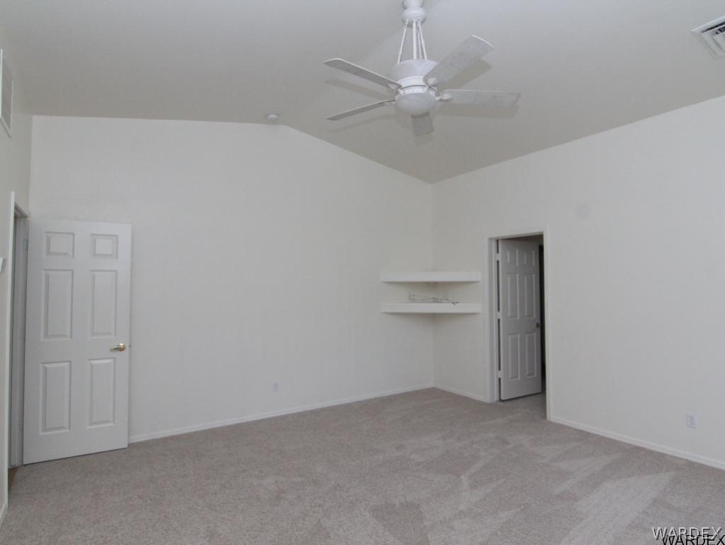 2010 East Cactus Wren Road Kingman, AZ 86409 - Photo 19 of 34 Master Bedroom