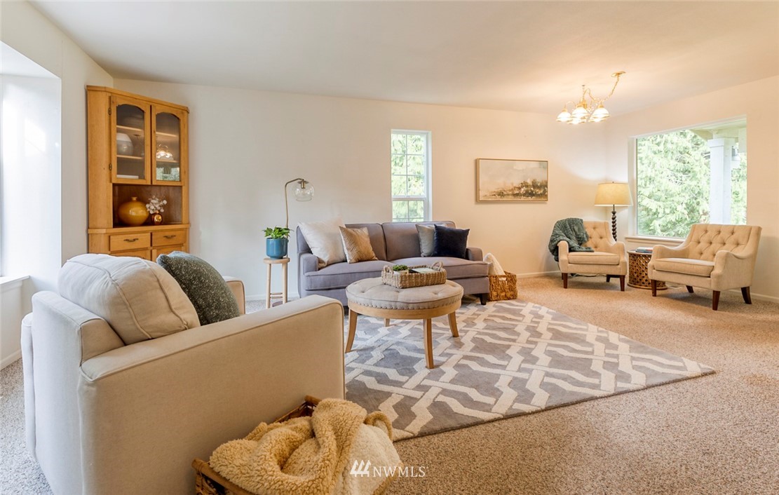 384 Sugar Hill Road Port Hadlock, WA 98339 - Photo 14 of 36 a living room with furniture and a large window