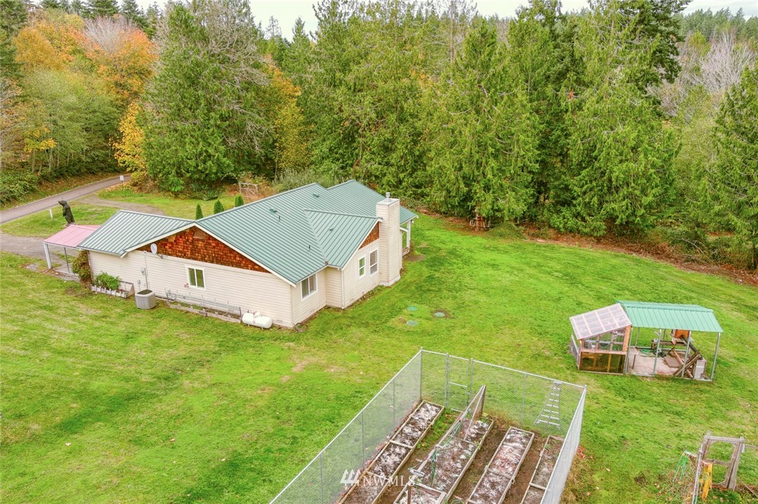 384 Sugar Hill Road Port Hadlock, WA 98339 - Photo 3 of 36 an aerial view of a house