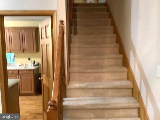 301 Rings End Road Millington, MD 21651 - Photo 25 of 40 Carpeted Stairs