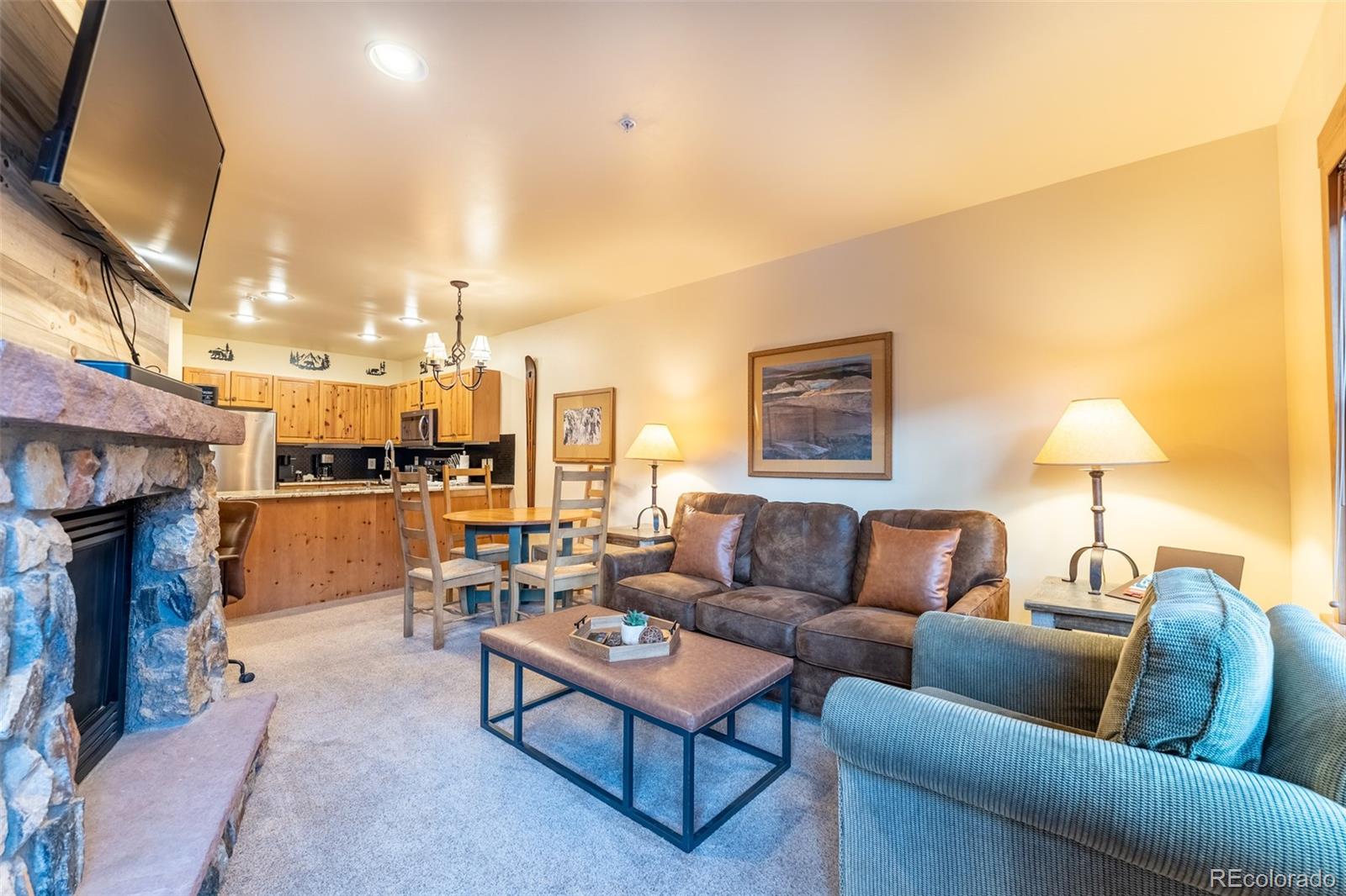 135 Dercum Drive, Unit 8595 Keystone, CO 80435 - Photo 4 of 33 a living room with furniture and a fireplace