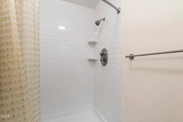 a room with table and chairs