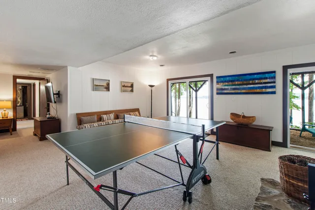 a bedroom with two beds and a window