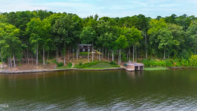 a view of lake with green space