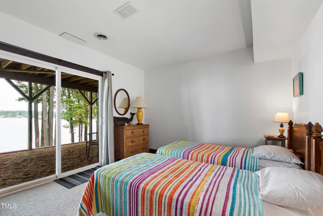 a view of balcony with wooden floor and outdoor seating