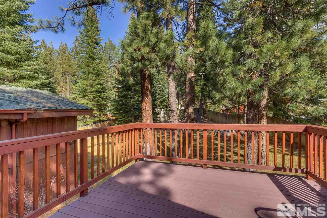 169 Chimney Rock Road Stateline, NV 89449 - Photo 20 of 25 a balcony with wooden floor and fence