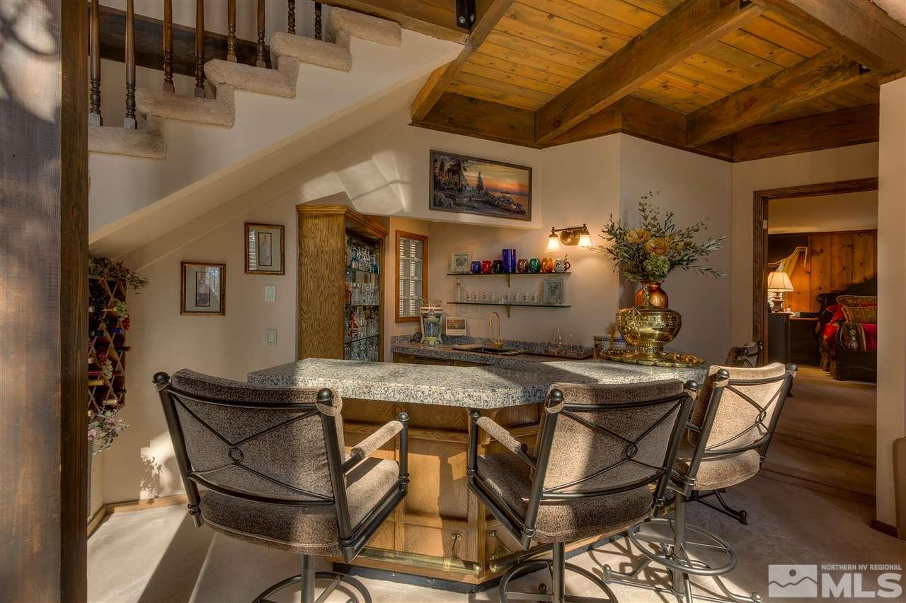 169 Chimney Rock Road Stateline, NV 89449 - Photo 5 of 25 a view of a dining room with furniture and a chandelier