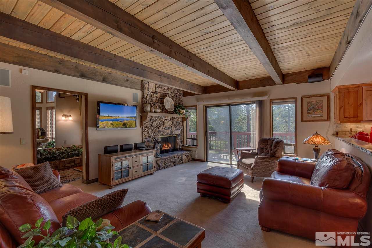 169 Chimney Rock Road Stateline, NV 89449 - Photo 7 of 25 a living room with furniture and a flat screen tv