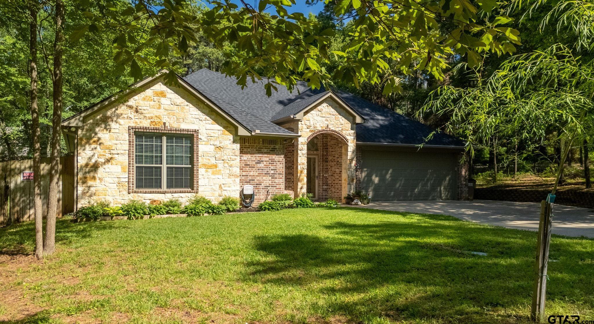 18488 Bluebird Circle Flint, TX 75762 - Photo 45 of 47 a front view of house with yard and green space