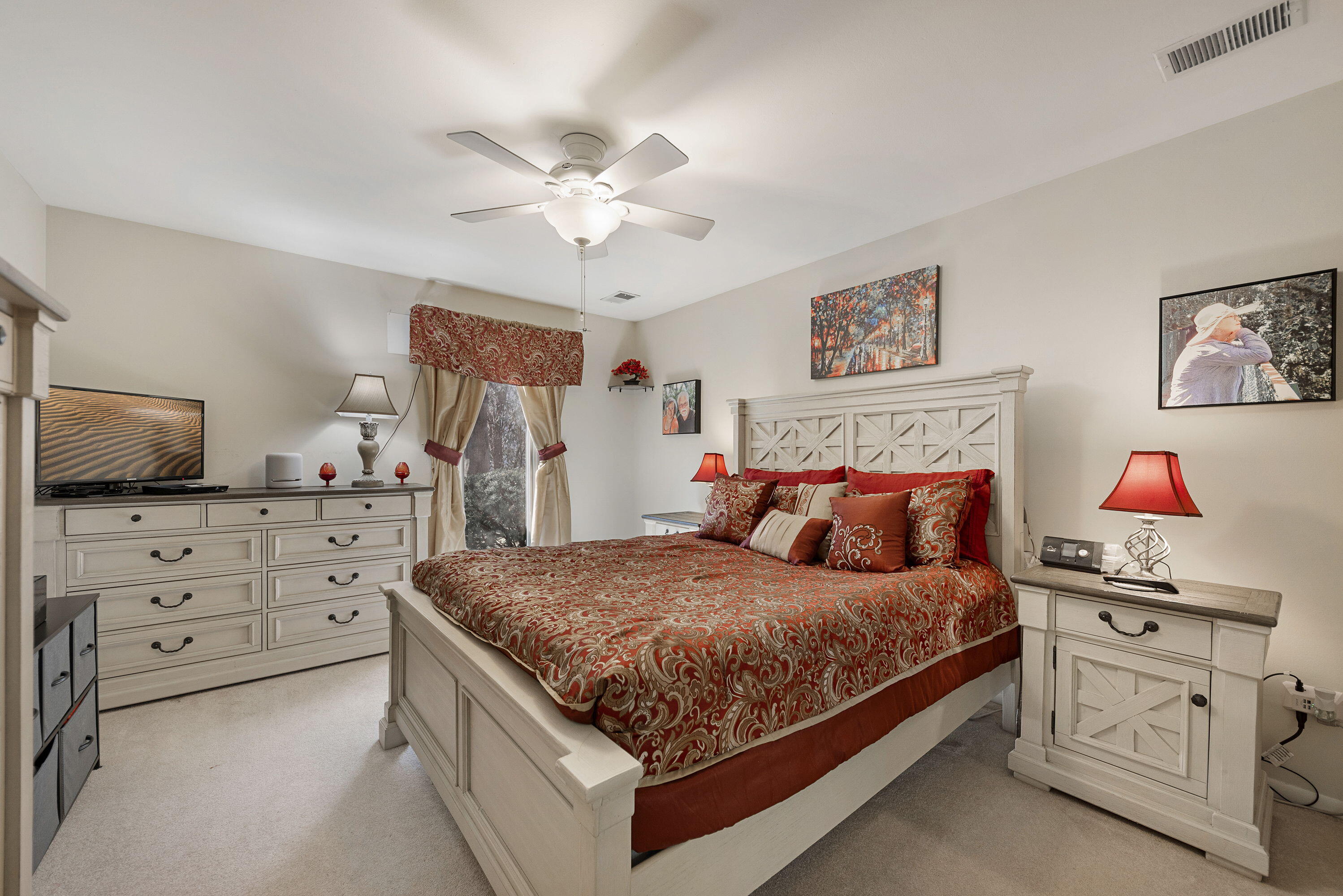 450 Old Stone Road, Unit 2 Munster, IN 46321 - Photo 13 of 16 a bedroom with a bed and a dresser