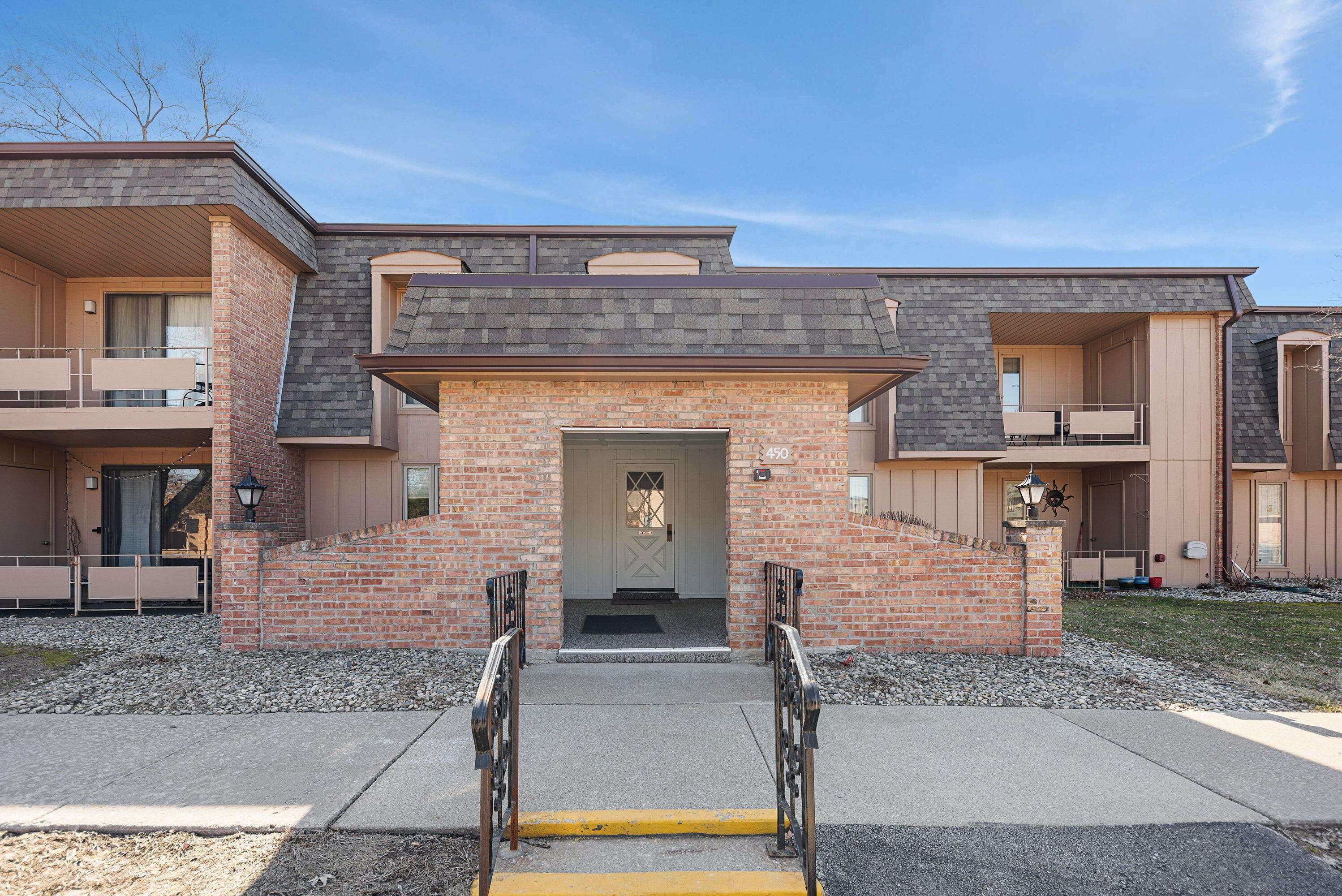 450 Old Stone Road, Unit 2 Munster, IN 46321 - Photo 2 of 16 front view of a house with a porch