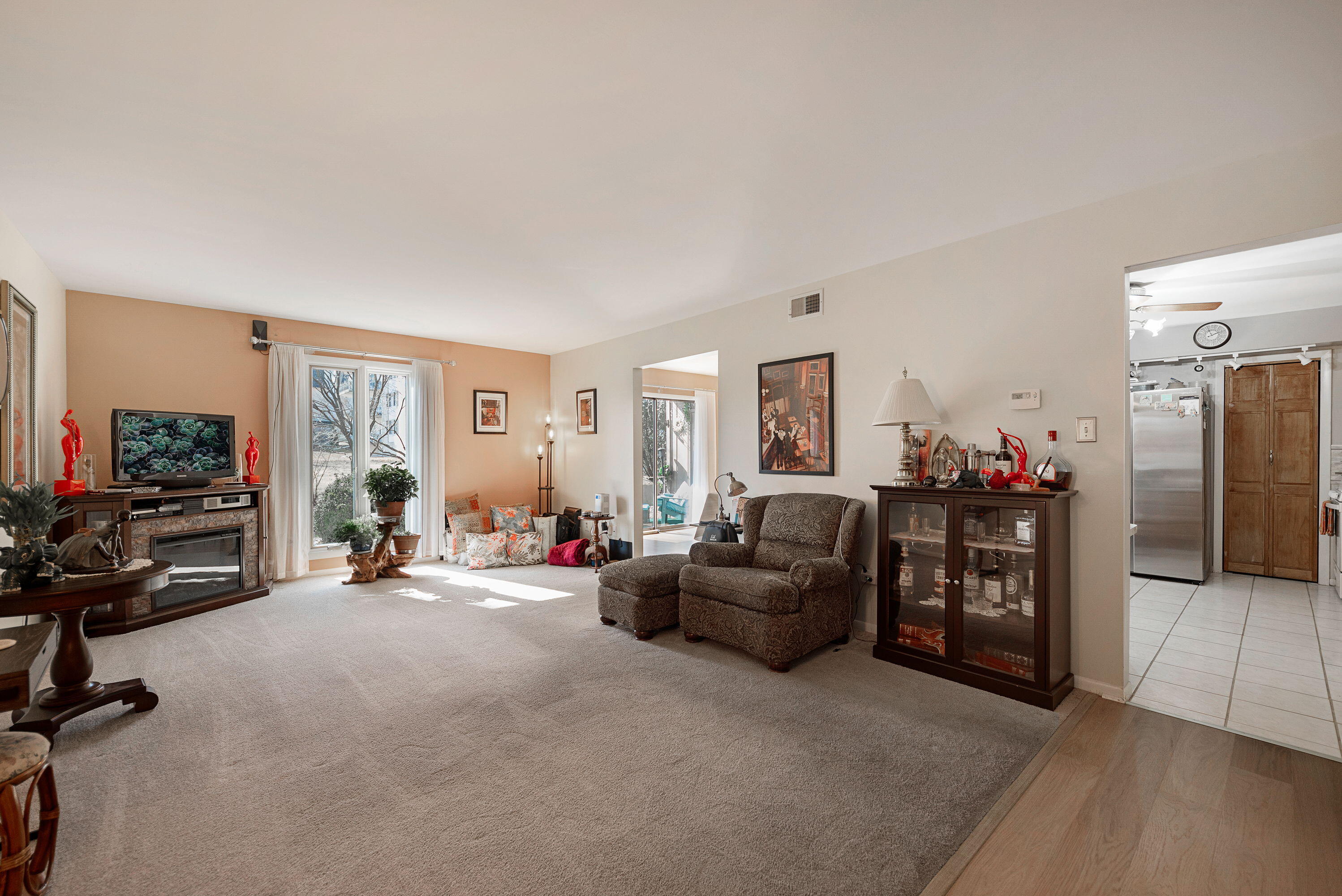 450 Old Stone Road, Unit 2 Munster, IN 46321 - Photo 4 of 16 a living room with furniture and a flat screen tv