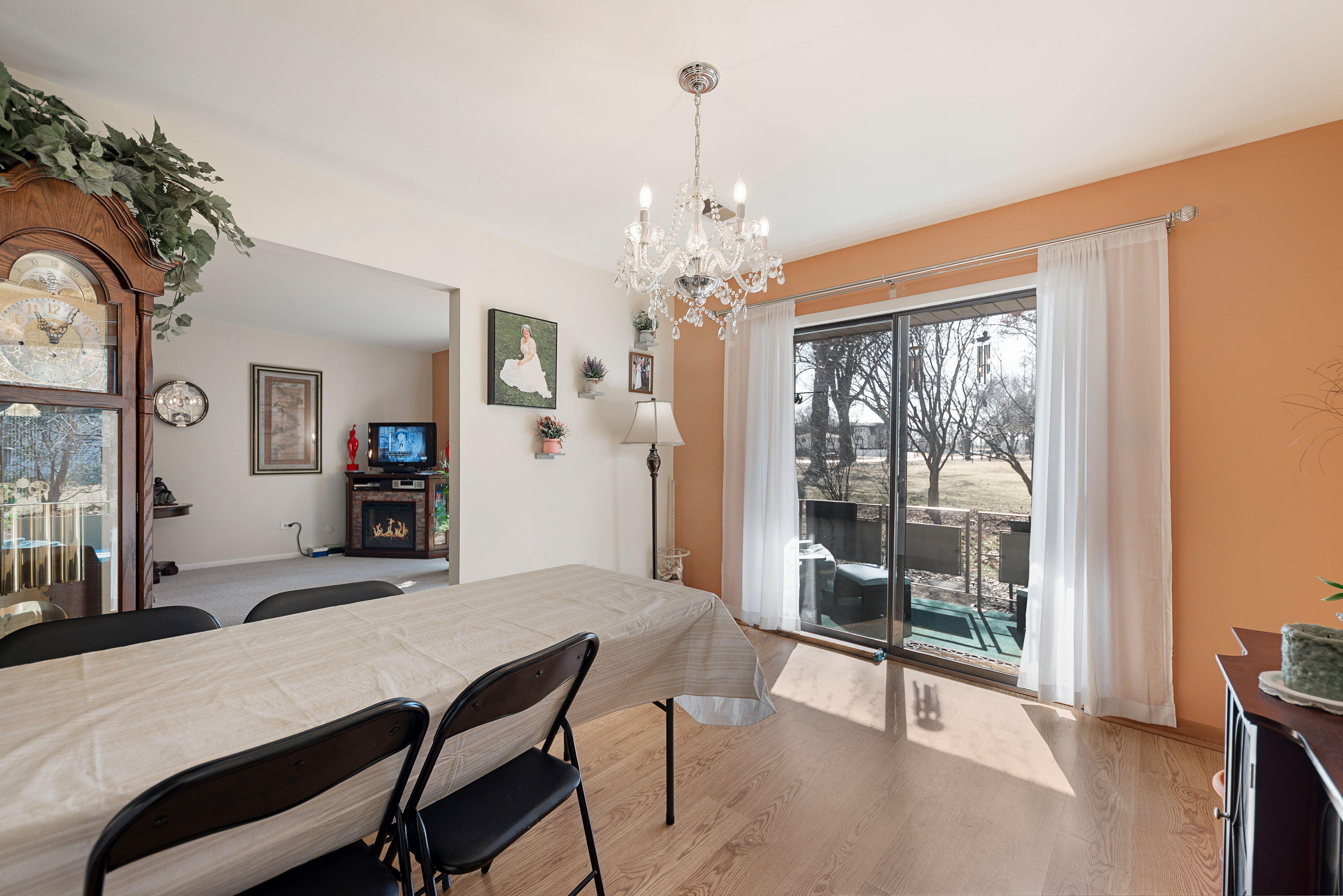 450 Old Stone Road, Unit 2 Munster, IN 46321 - Photo 9 of 16 a view of a dining room with furniture window and wooden floor
