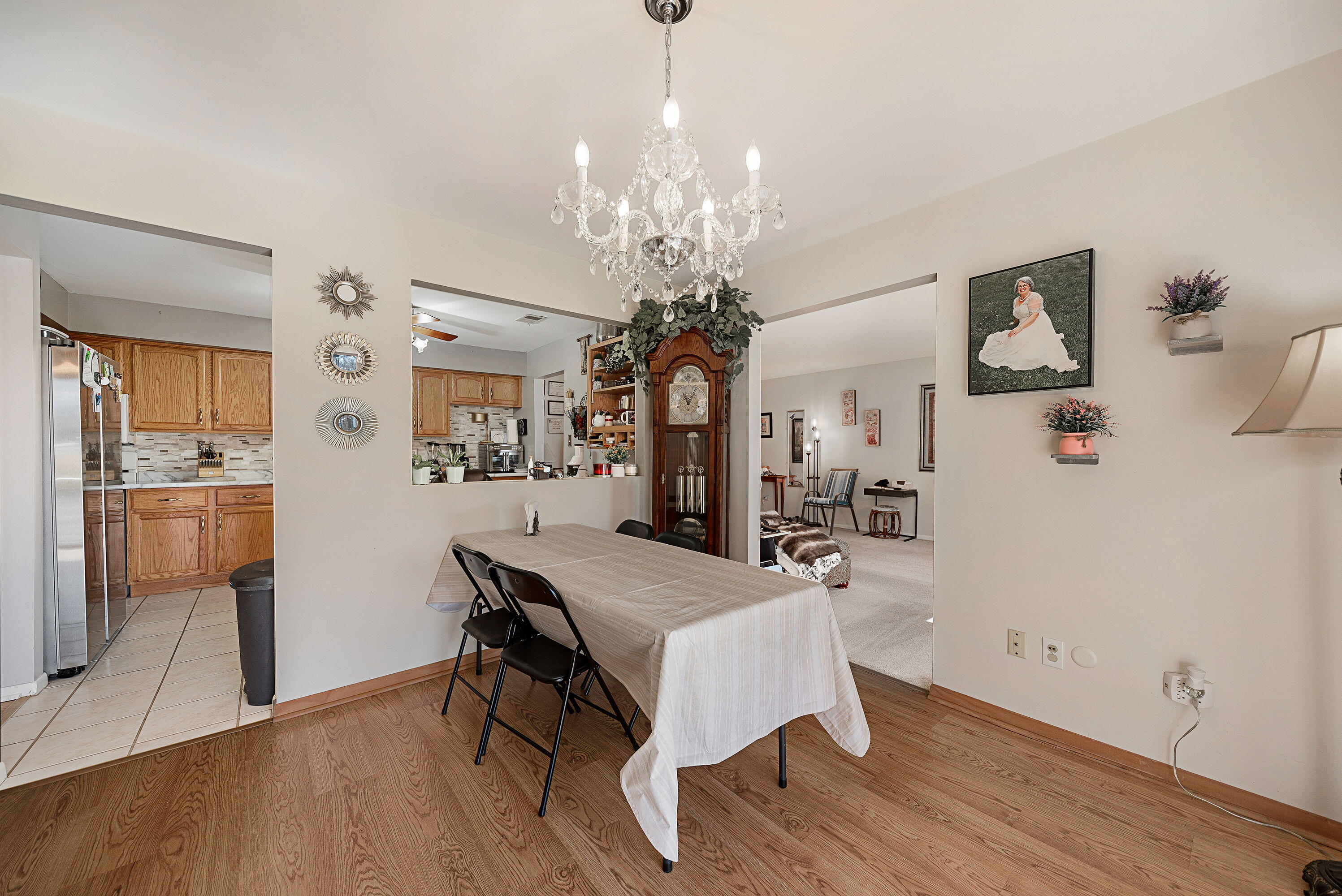 450 Old Stone Road, Unit 2 Munster, IN 46321 - Photo 10 of 16 a view of a dining room with furniture and wooden floor