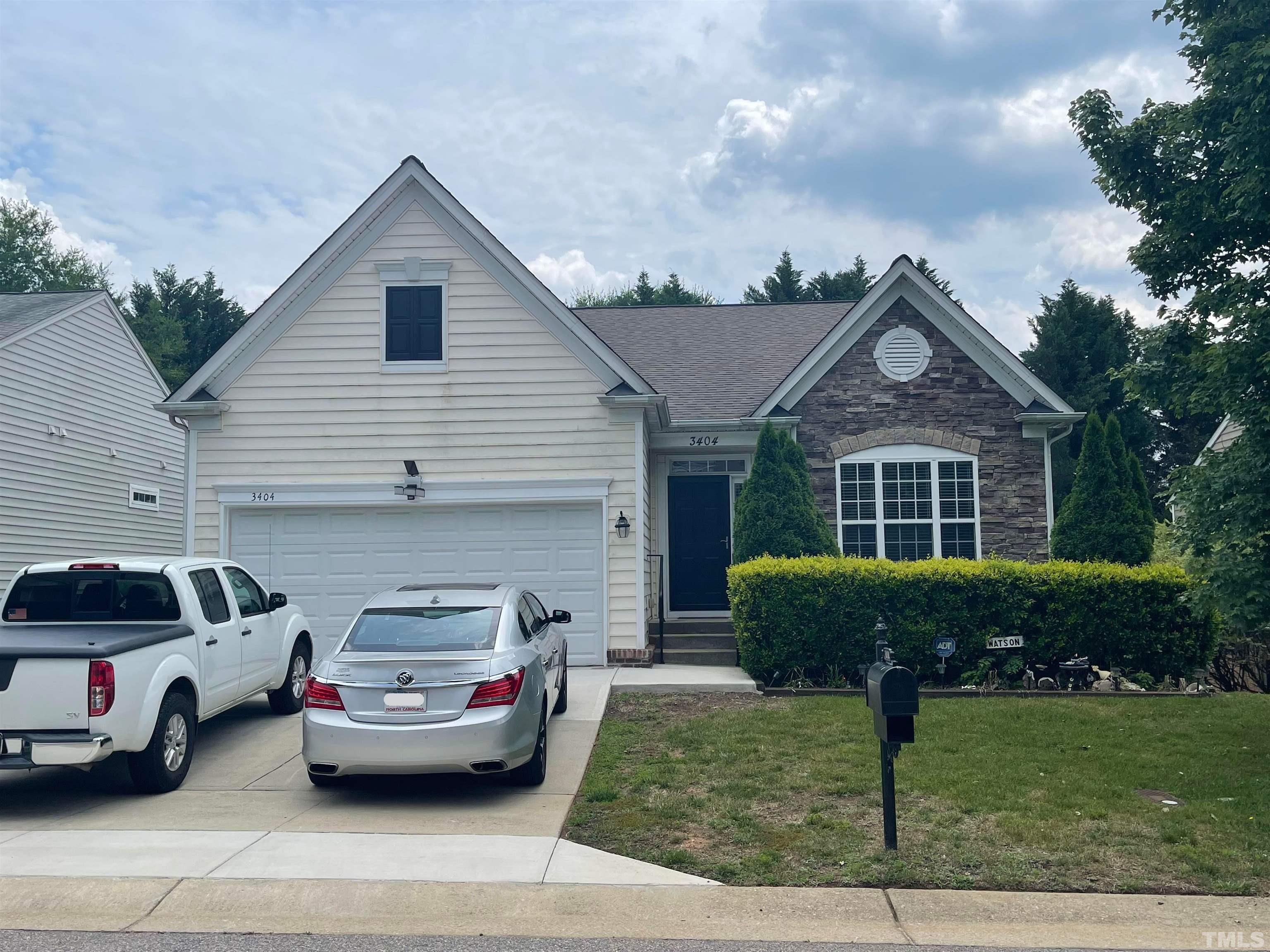 3404 Secretariat Way Raleigh, NC 27614 - Photo 1 of 44 a front view of a house with garage