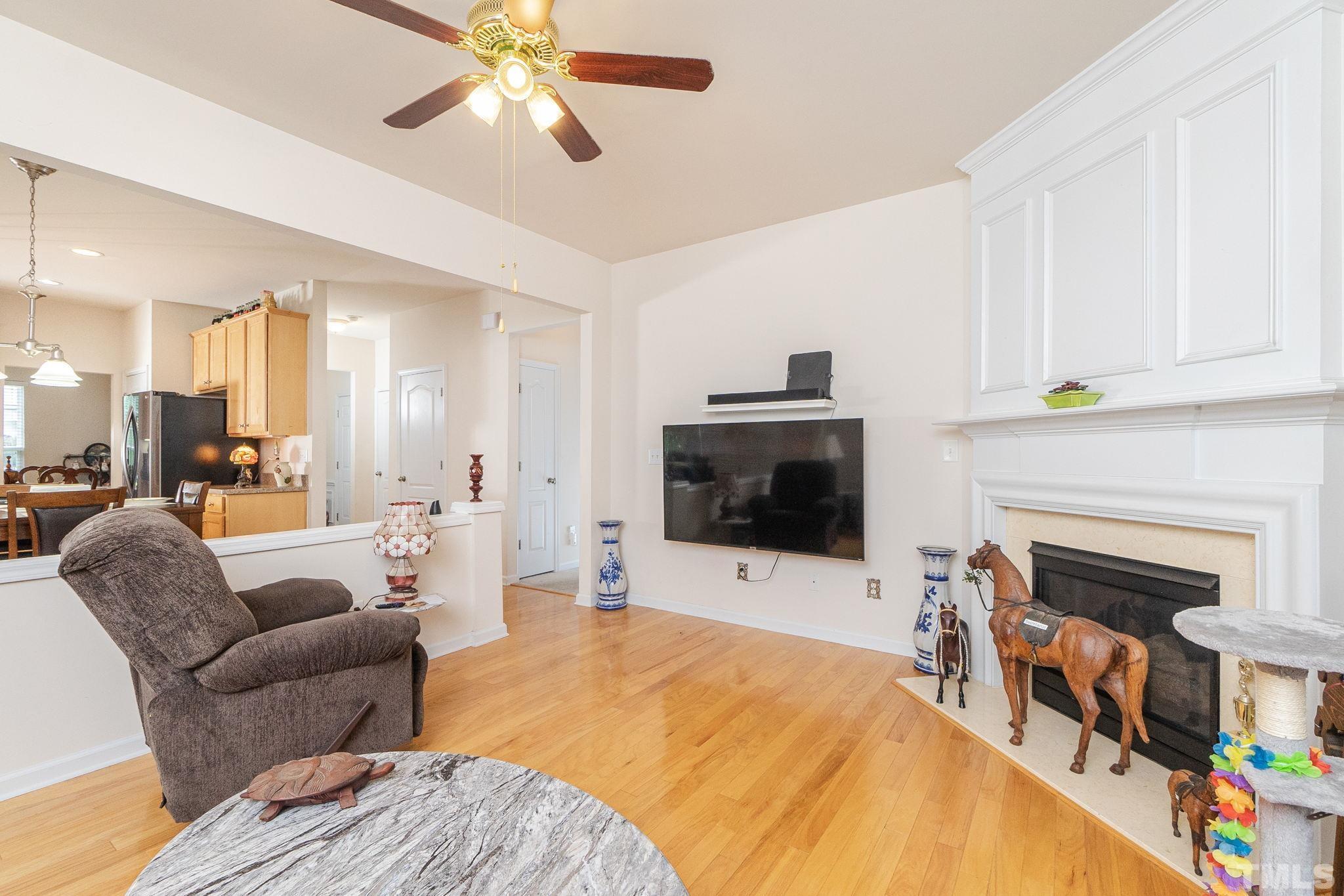 3404 Secretariat Way Raleigh, NC 27614 - Photo 11 of 44 a bedroom with furniture and a flat screen tv