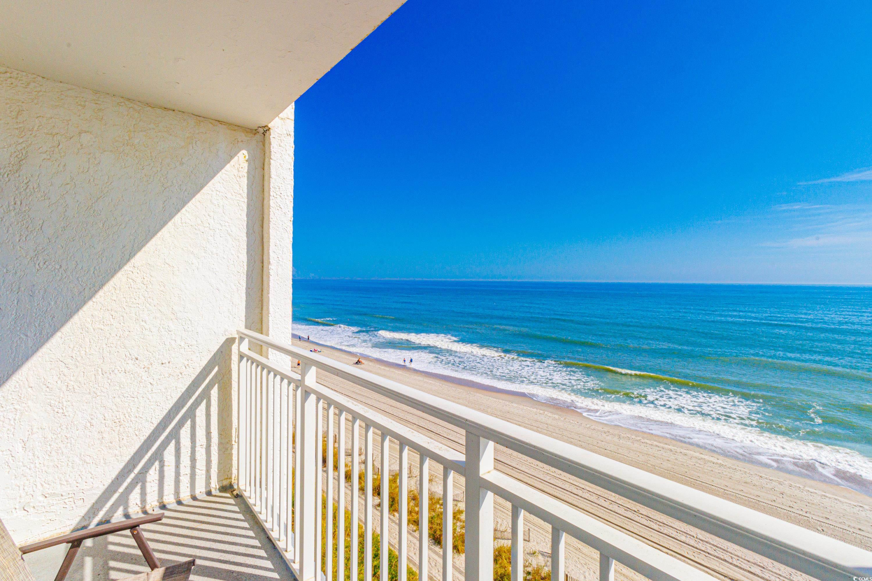 1207 South Ocean Boulevard, Unit 20703 Myrtle Beach, SC 29577 - Photo 5 of 22 Balcony featuring a beach view and a water view
