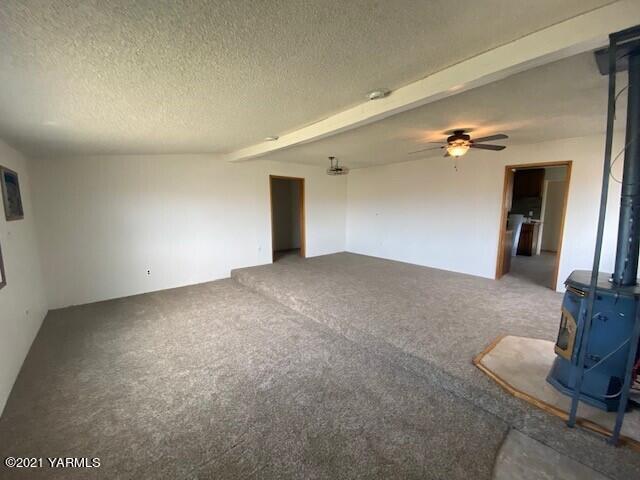 320 Lower County Line Road Prosser, WA 99350 - Photo 9 of 14 a view of a livingroom with furniture and floor to ceiling window