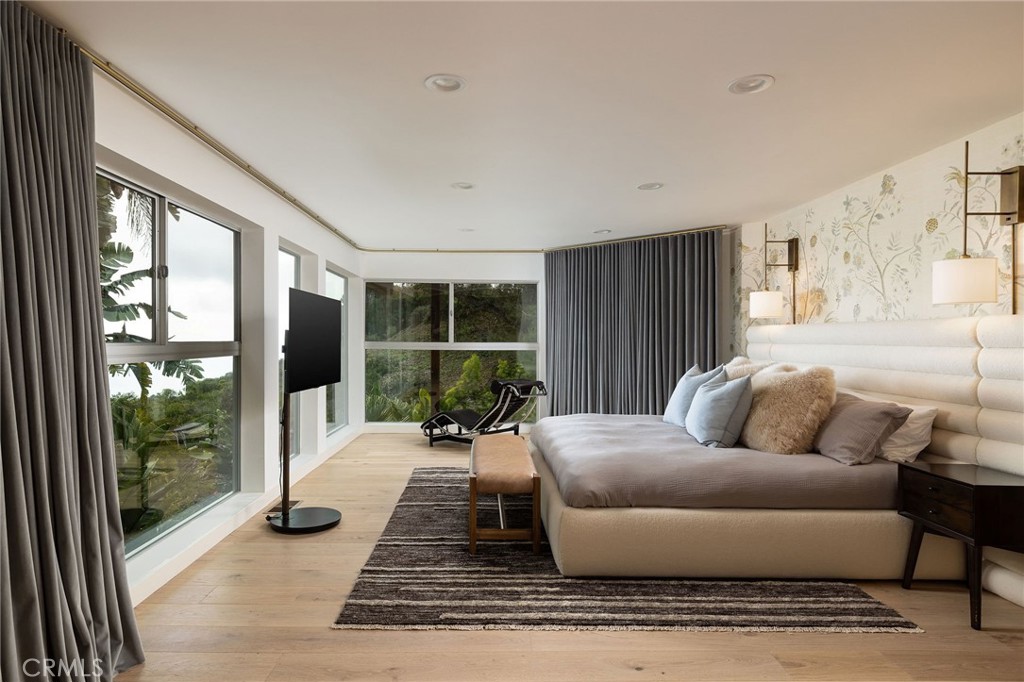 865 Balboa Avenue Laguna Beach, CA 92651 - Photo 12 of 60 a living room with furniture and a floor to ceiling window