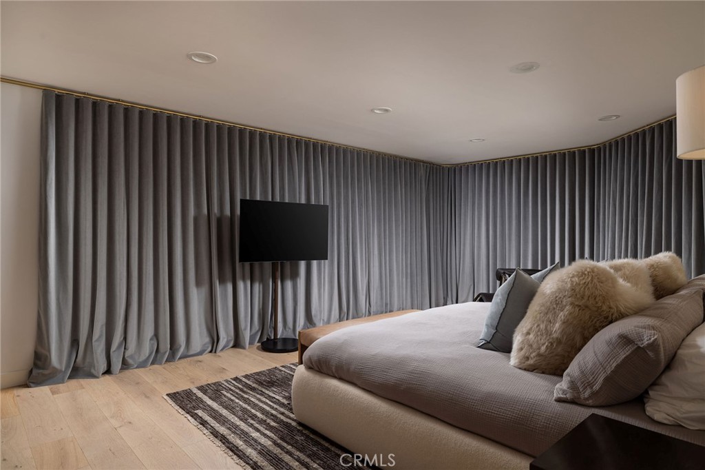 865 Balboa Avenue Laguna Beach, CA 92651 - Photo 16 of 60 a bedroom with a bed and a window