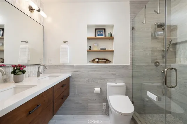 a view of a hallway with washer and dryer