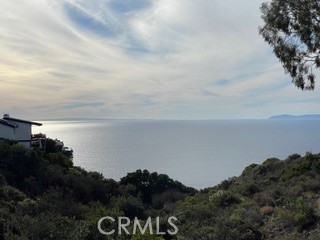 865 Balboa Avenue Laguna Beach, CA 92651 - Photo 47 of 60 a view of a lake and mountain in back