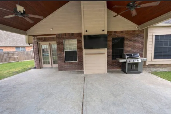 wooden floor in an empty room with a fireplace